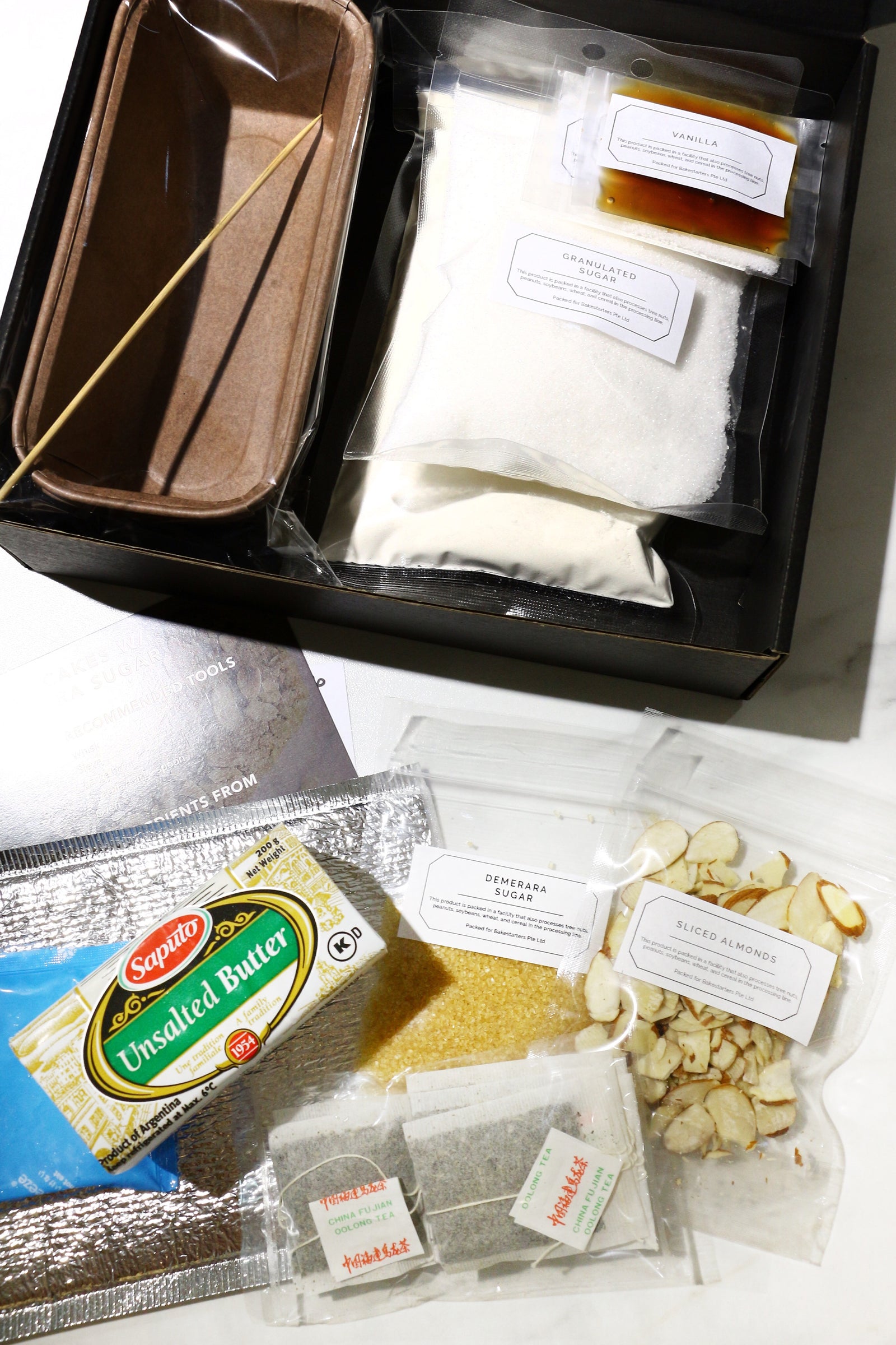 Temp-tea-tion | Oolong Tea Loaf Cakes w/ Sliced Almonds & Demerara Sugar (makes 2x loaves)