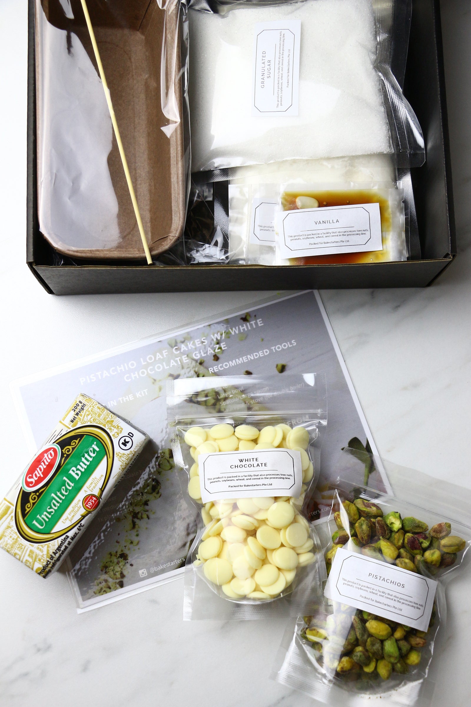 Glamorous Gwen | Pistachio Loaf Cakes w/ White Chocolate Glaze (makes 2x loaves)